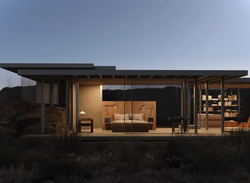 Casa modernista de noche en el desierto de Utah con acristalamiento de suelo a techo